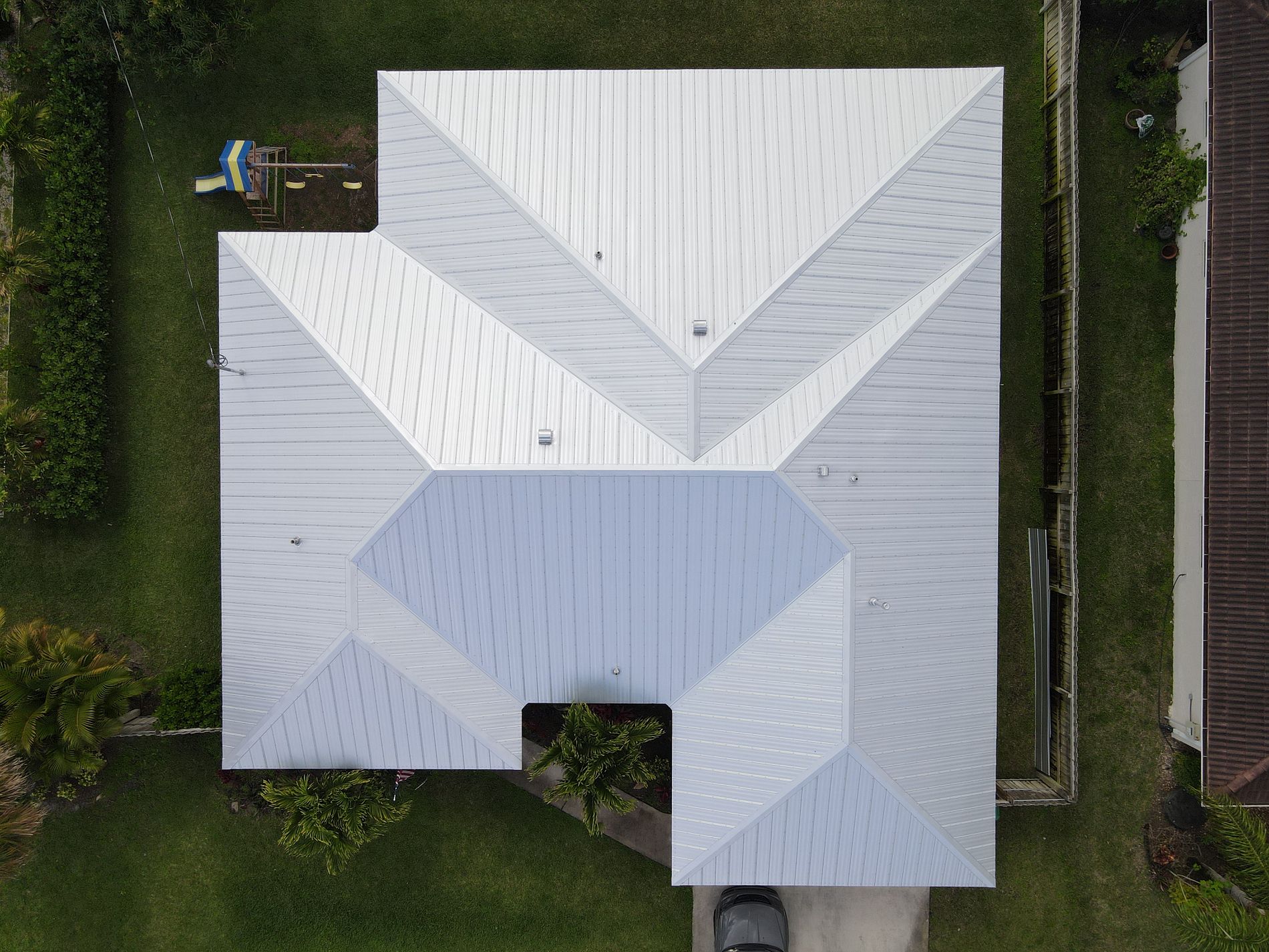 5V Crimp metal roof installed on a Florida home with a clean, traditional V-shaped panel design.