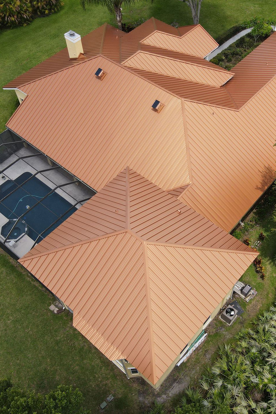 1-inch Nail Strip metal roof in Copper Penny finish installed on a residential home.